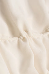 Cut-Out Semi-Sheer Ruched Halterneck Crop Top in Ivory